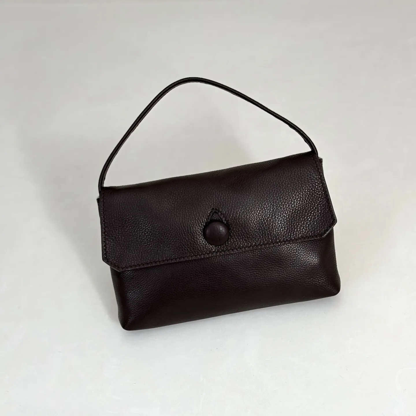 더 로우 샐리 백 레더 다크 브라운  18X11X3cm